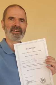 Berufsurkunde von Christof Martin zur Erlaubnis der Führung der Berufsbezeichnung Beschäftigungs- und Arbeitstherapeut (Ergotherapeut), ausgestellt im Oktober 1993 in Münster.